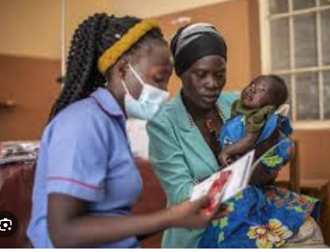 Healthcare worker providing maternal and child care